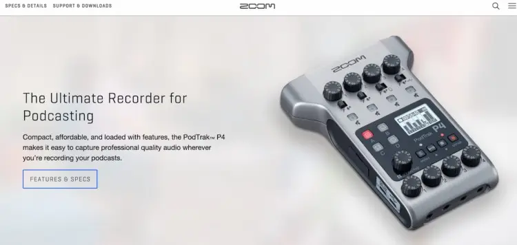 Zoom PodTrak P4 podcast recording device with multiple input knobs and a compact, portable design.