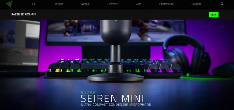 Razer Seiren Mini condenser microphone featured in a gaming setup, showcasing its ultra-compact design and ideal use for streaming or podcasting.