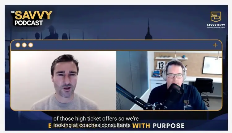 Liam Austin speaking as a guest on The Savvy Podcast alongside the host, showcasing an engaging podcast discussion about high-ticket offers for coaches and consultants.