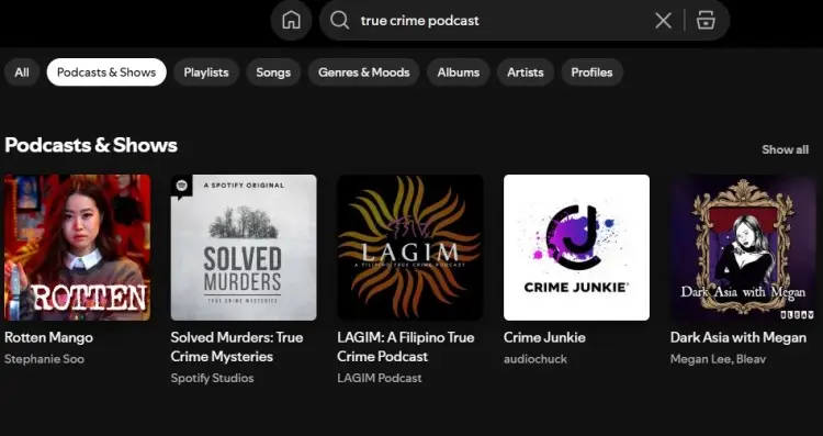 Spotify search results showing popular true-crime podcasts including Rotten Mango, Solved Murders, Crime Junkie, and Dark Asia with Megan.