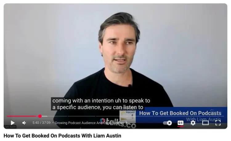 Liam Austin explaining what makes someone great at podcasting during a training session
