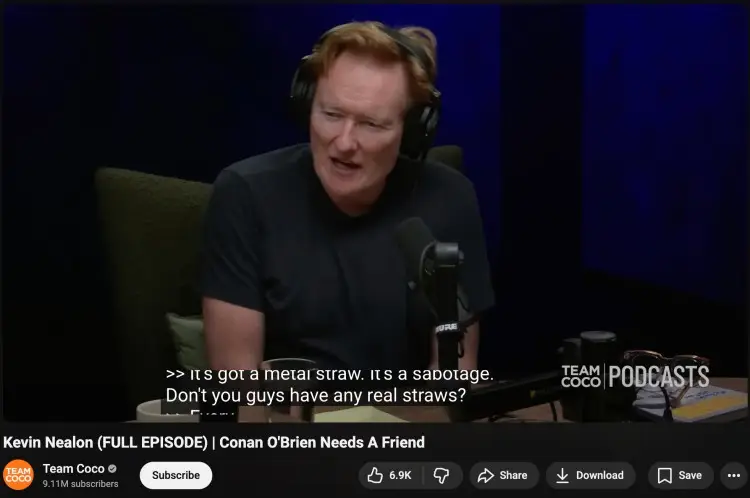 Comedy podcast guest speaking into a microphone during an episode that encourages audience participation through humor and storytelling.