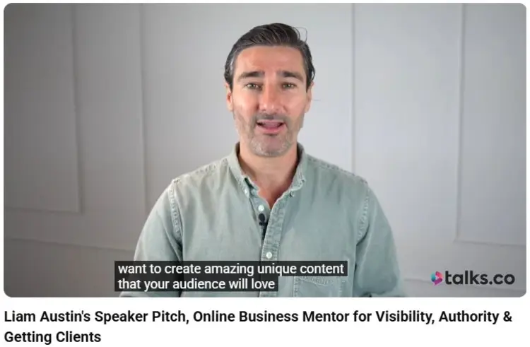 Liam Austin delivering his speaker pitch about visibility and authority, sharing insights on launching a podcast and creating content that attracts clients.