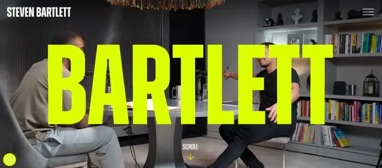 Steven Bartlett website hero section highlighting a renowned public speaker in conversation during an interview-style setting
