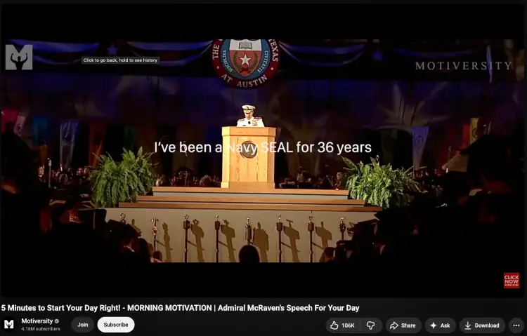 A speaker delivering a motivational keynote to a large audience as they give a speech.
