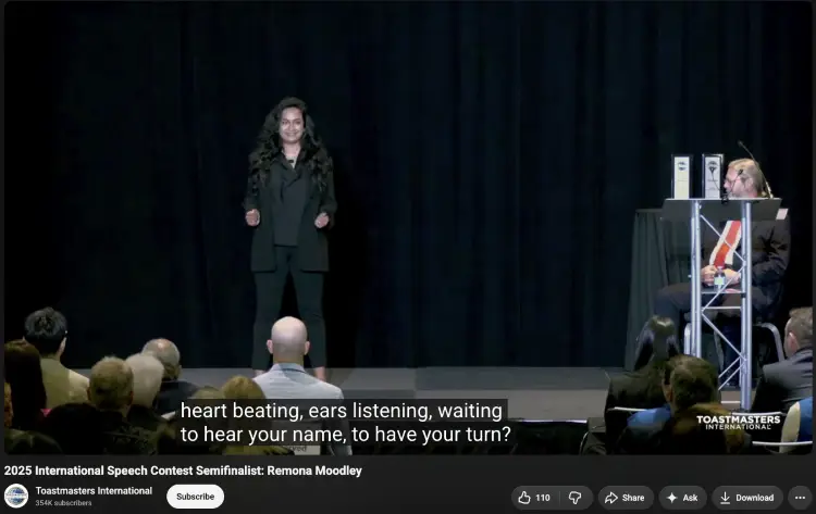 Speaker on stage in a speech contest preparing to demonstrate her extemporaneous speaking skills