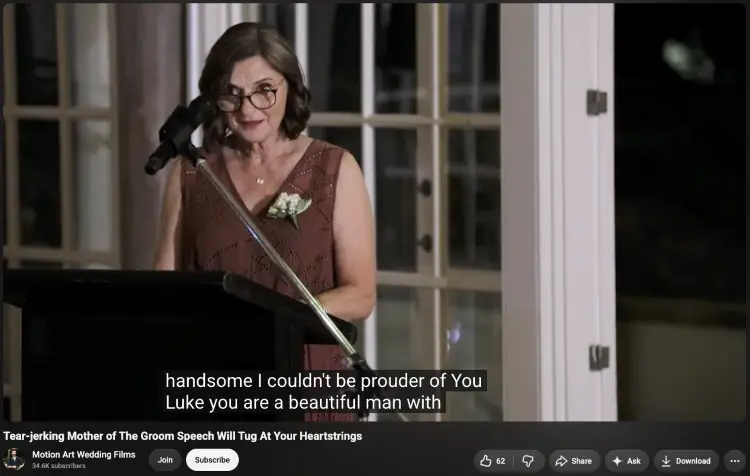 Woman at a podium giving a mother of the groom speech during a wedding reception