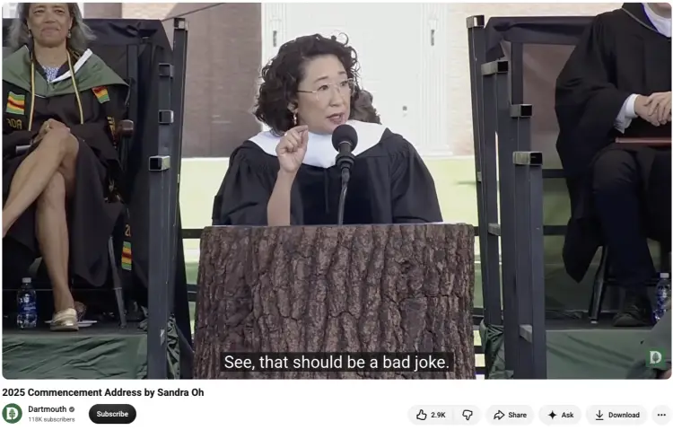 Sandra Oh speaking at a commencement ceremony about humor and learning from mistakes