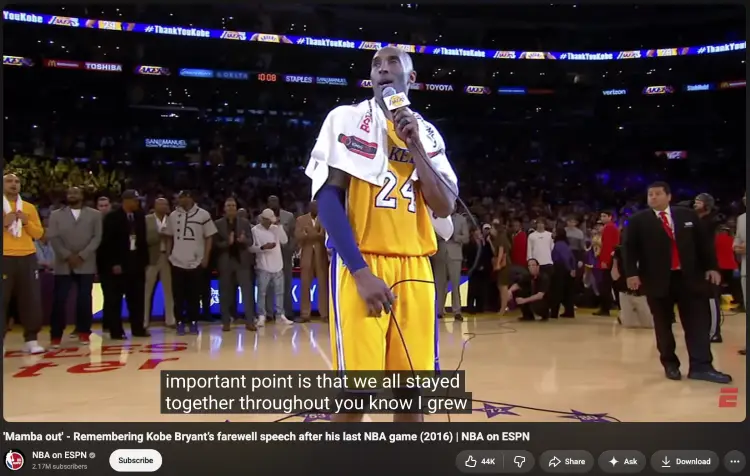 A sincere farewell speech delivered on a basketball court in front of a large audience