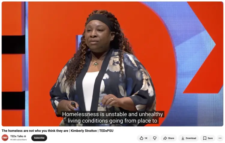 Speaker challenging her audience to think differently about homelessness and common assumptions