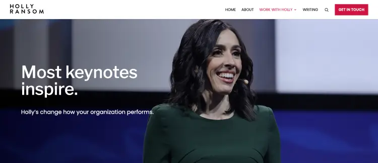 Keynote speaker Holly Ransom on stage showing how a compelling presentation can make an impact