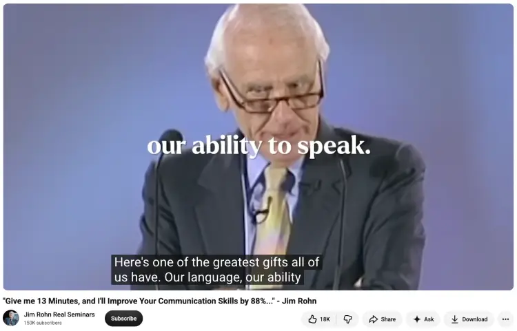 Motivational speaker Jim Rohn delivering a seminar about language and the ability to speak, sharing insights on how to enhance communication skills.